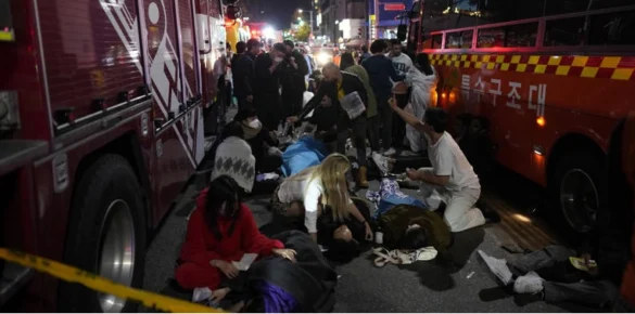  many individuals fell and overturned to each other "like dominos" after they were being moved by others at a limited downhill rear entryway close to Itaewon's Hamilton Inn.